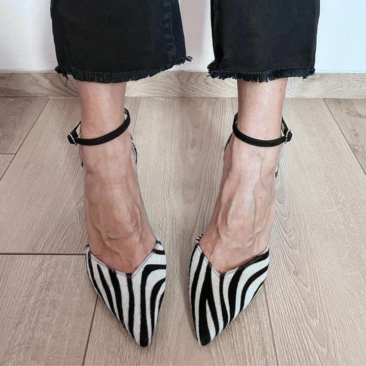 High-heeled shoes with zebra print and ankle strap