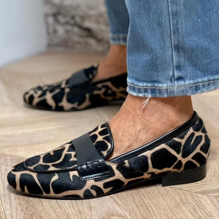 Animal print moccasin with elegant detail