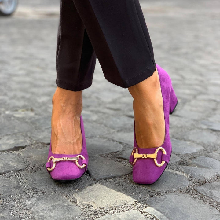 Elegant high-heeled shoes with gold detailing