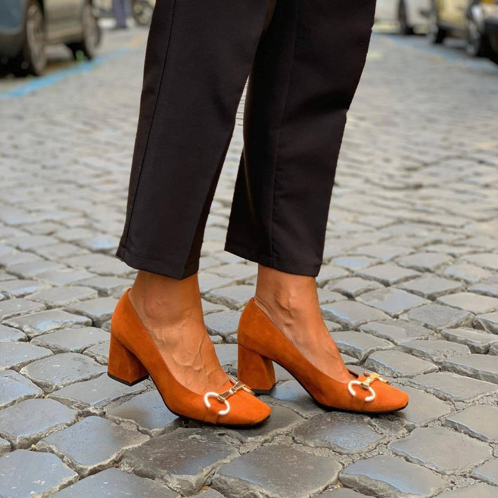 Elegant high-heeled shoes with gold detailing