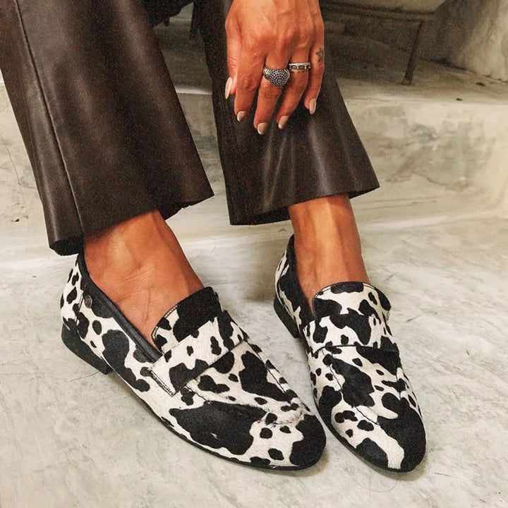 Elegant animal-print moccasins