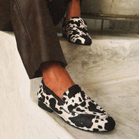 Elegant animal-print moccasins
